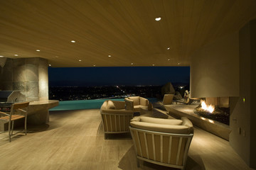 Interior of spacious living room with fireplace