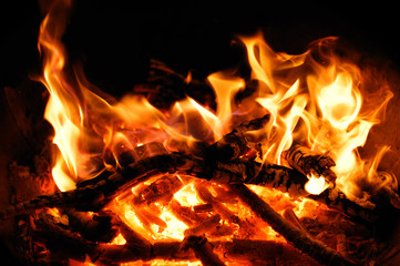 Fototapeta na wymiar firewood ash and fire flame