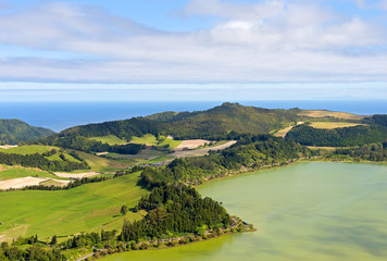 Fototapeta na wymiar Aerial view on Lagoa das Furnas countryside on Sao Miguel Island, Portugal. Summer countryside landscape of Azores archipelago.