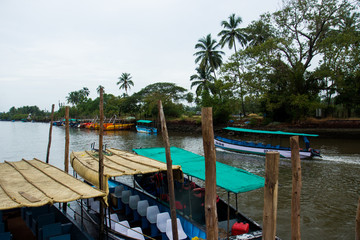 Fototapeta na wymiar Wooden country boats for pleasure on river Goa, India