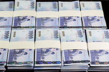 New Taiwan Dollars in stacks