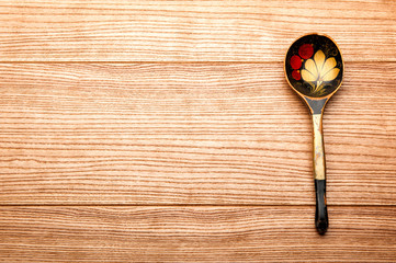 old wooden spoon on the table