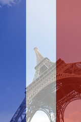 Low Angle view of Eiffel Tower in front of French flag background