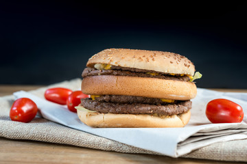 delicious American cheese burger with tomato