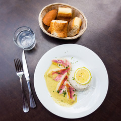 french cuisine dish with lemon and salmon