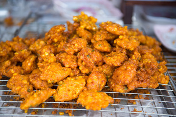 fried fish patty with corn mix for sale in market