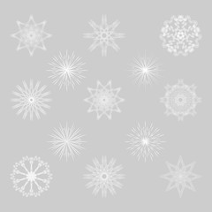 Snowflake set. Collection of different white snowflakes on grey background. Snowflakes for Christmas design. Hipster Style Design for Labels, Badges and Icons.
