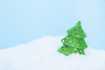 Christmas trees on snow background sky