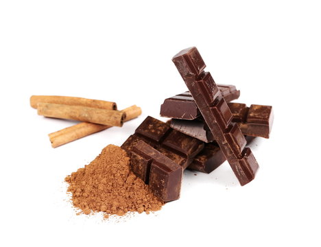 chocolate bars with cinnamon sticks and pile cocoa powder isolated on white background