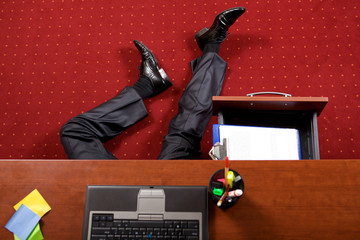 Businessman lying in the office