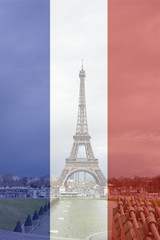 Eiffel Tower in front of French flag background