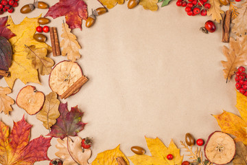 Fototapeta na wymiar Autumn fall leaves frame on craft paper