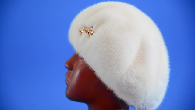 pearly beret from natural mink on mannequin.