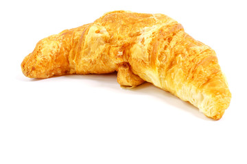 fresh big croissant on white background