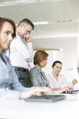 Business people working in office