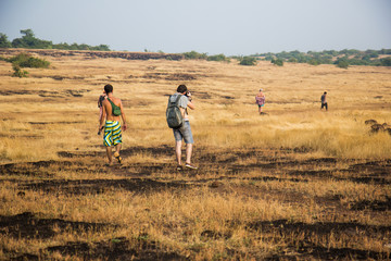 a man walking in the desert in India