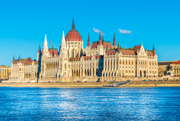 Fototapeta premium Hungarian Parliament and the Danube river in Budapest, Hungary