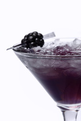 Cocktail served in a glass, with fruits