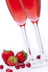 Cocktail served in a glass, with fruits