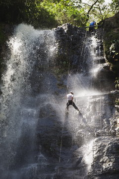 Rappelling on Juan Curi waterfall, adventure sports capital of Colombia, San Gil, Colombia