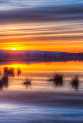 Fototapeta premium Entspannender schöner , Sonnenuntergang an einem See in Deutschland