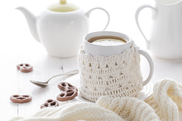 Cup hot tea winter evening