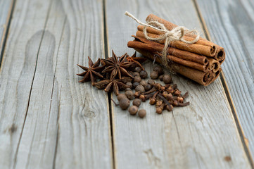 set of spices on wood background