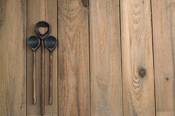 Fototapeta premium Wooden spoon on wooden background
