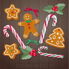 Set of gingerbread Christmas cookies with holly and candy canes.