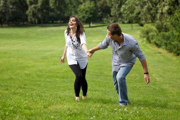 Young couple enjoying in park