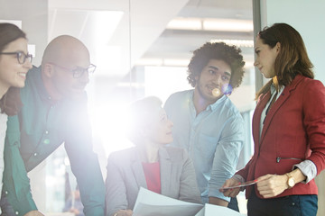 Multi-ethnic business people having discussion in office