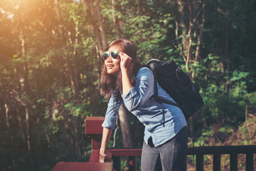 Young attractive woman enjoy with nature surrounding, achieved a