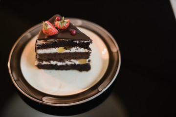 Beautiful chocolate cake with fresh berry,chocolate pie and berries