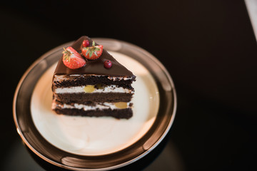 Beautiful chocolate cake with fresh berry,chocolate pie and berries