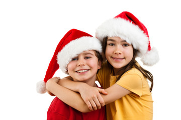 Christmas time - girl and boy with Santa Claus Hat 
