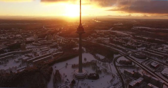 AERIAL. Beautiful sunset footage of TV tower of Vilnius, capital of Lithuania, panorama view. 4k