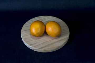 Fruit on a wooden round stand