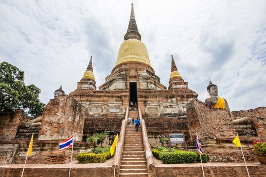 Buddha statues against ancient pagoda at Ayutthaya