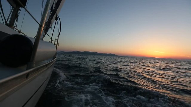 Sailing regatta in Greece, during sunset.