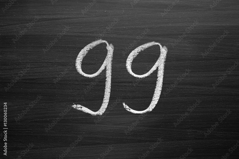 Wall mural number ninety nine enumeration written with a chalk on the blackboard