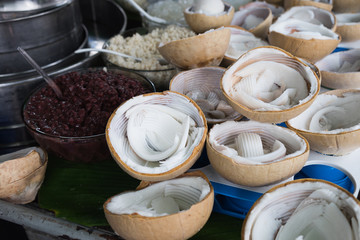 Coconut for making Thai Dessert at "Chatujak Market", Bangkok, Thailand