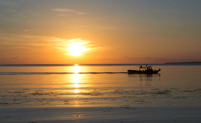 Naklejka na ściany i meble Sunset sky and ocean landscape with boat. Summer vacation travel image.