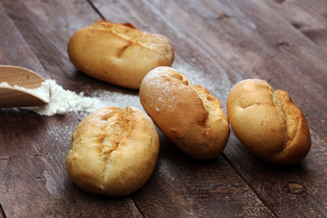 Homemade bread loaf on rustic dark background