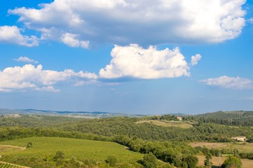 Fototapeta na wymiar Vibrant landscape of Tuscan countryside near Monteriggioni