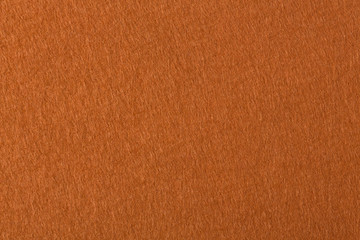 Orange felt fabric texture background.