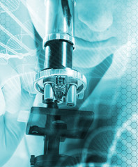 Scientist looking through a microscope DNA