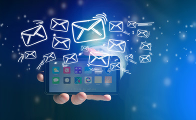 Concept of sending message with smartphone with email icon aroun