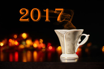 New Year. Christmas. Steam from a cup of coffee
