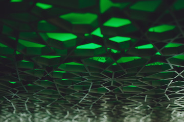 Tilt shift shooting of green ornamental, self illuminated texture placed on ceiling of modern interior