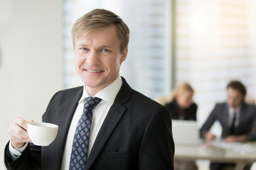 Young smiling businessman